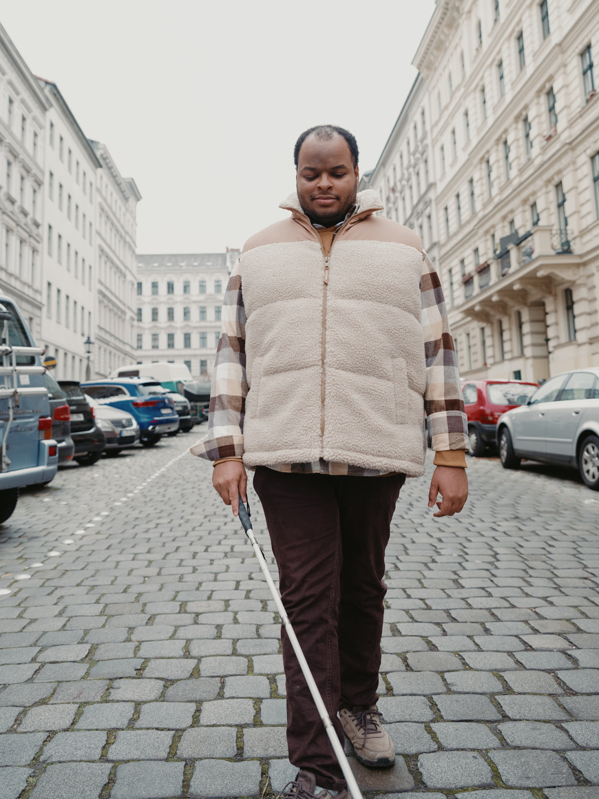 Blind Man Walking Outdoors